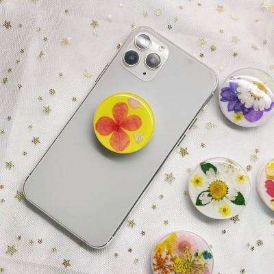 China New Arrival Products Popular Dry Phone Socket Adjustable Tending Flower Folding Glitter Phone Expanding Flexible Stand for sale