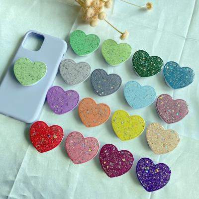 China New Hot Selling Adjustable Mobile Phone Accessories Twinkle Power Heart Shape Universal Phone Finger Grip Holder for sale