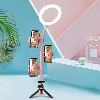 China Mini OEM Silicone Light Weight Portable Extendable Smartphone Camera Selfie Photography Light Tripod Stand for sale