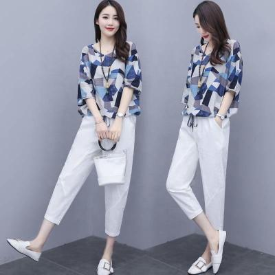 China New western style fashion wide-leg European station QUICK-DRY pants women's age-reducing slit two-piece casual short-sleeved two-piece blouse for sale