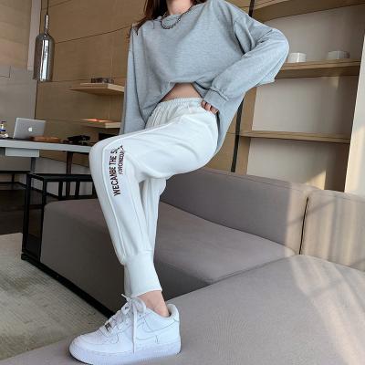 China Anti-Wrinkle Adiathermic Power Pant Woman Jogging Pure Cotton Ladies Sweatpants Shapes Letter Embroidery Ladies Harem Pants Narrow-Leg Pants Ants for sale