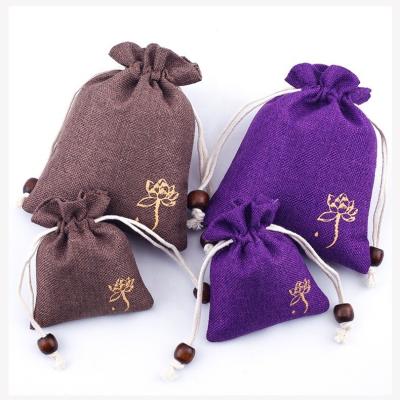 China Custom Logo Jute Linen Drawstring Lashes Bag Burlap Pouches for Makeup Powder for sale