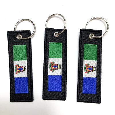 China Modern Wholesale Cheap Custom Brand Logo Embroidery Keychain High Quality Letter Embroidered Tag Key Chain for sale