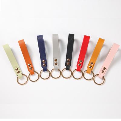 China Custom Logo Cheap Custom Business Pu Car Leather Key Chain Leather Keychain for sale