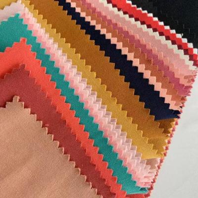 China Stretch Plain Toko Fabric NR LAMLAM Spandex Stretch Bengaline Fabric Pants Nylon Rayon Fabric for sale