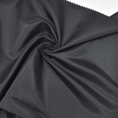 China 50D *75D Anti-Static Glossy 100% Polyester Satin Fabric for sale