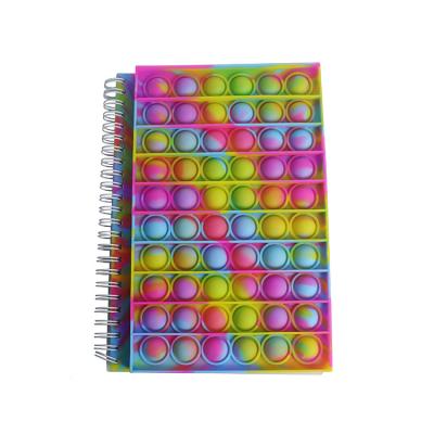 China Mini Creative Children Relaxing Notebook Rainbow Puzzle Silicone Bubble A6 Notebook Notepad for sale