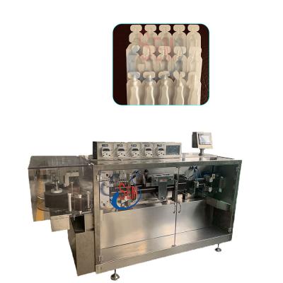 China Automatic Plastic Packing Machine Automatic Plastic Ampoule Liquid Filling And Beverage Cosmetic Liquid Packing Machine for sale