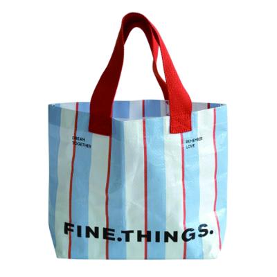 China Eco-friendly Striped Recycled Tote Bag Plastic Film Advertising Gift Bag PP Woven With Compound Handle Color Printing for sale