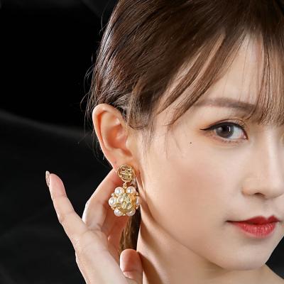 China 2022 TRENDY pearl fashion personality grape cluster design spherical earrings new summer earrings for sale