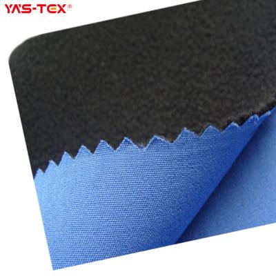 China Polyester spandex 4 way anti-static stretch fabric with windproof fleece fabric for winter ski jackets for sale