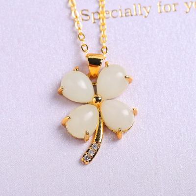 China Hetian Jade Women Clavicle Chain Pendant White Stone Jade 925 Hetian Stone Natural Four Leaf Clover Pendant Necklace for sale