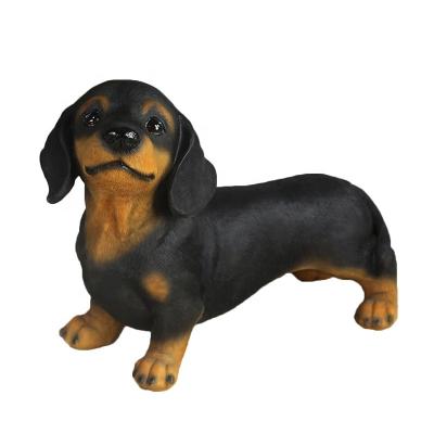 China Other Wholesale Customized Resin Open Christmas Holiday Golden Dachshund Dog Statue Standing Up For Present Home Decor Gift for sale