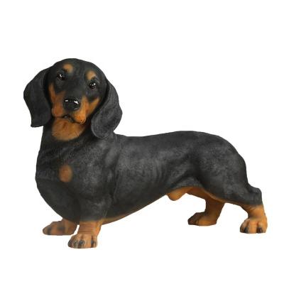 China Other Creative Resin Bedroom Decorative Statue Holding Dachshund Dog Figure GIFT For Living Room Garden Polyresin Animal for sale