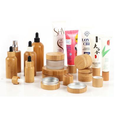 China Custom TAOTAOJU Skin Care Bottle Cover Essence Emulsion Wood Caps Face Cream Bamboo Cover Cosmetics Child Safe Accessories for sale