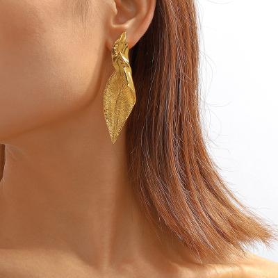 China Hyperbole Gift Jewelry Exaggerated Design Twisted Leaf Earrings Vintage Gold Plated Leaf Earrings For Women Girls for sale