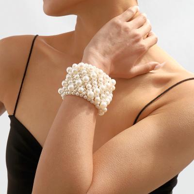 China Fashionable creative celebrity pearl geometric multi-layer elastic bracelet Internet elegant women's retro beaded bracelet for sale