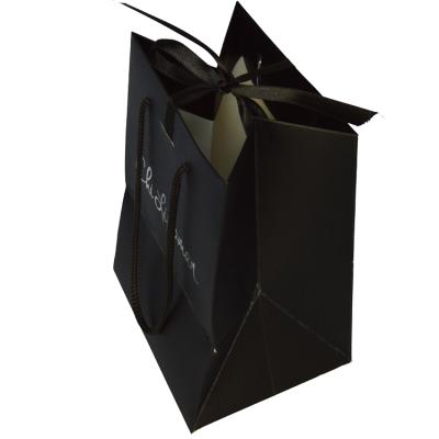 China Recyclable Custom Craft Jewelry Gift Making Machine Paper Bag With Black Handle For Clothing Shopping for sale