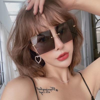 China New high quality 2022 frameless frameless cut edge star the same fashion trend sunglasses women for sale