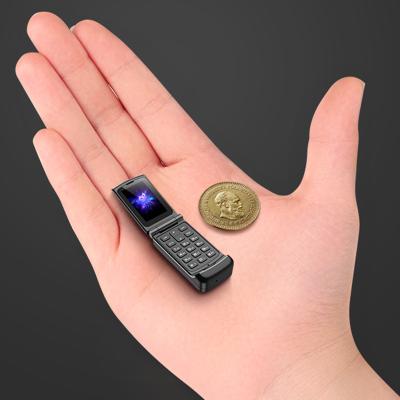 China Ulcool Youleku F1 Mini WIRELESS CHARGE Mobile Phone Super Flip Phone Student Male And Female Thumb Phone for sale