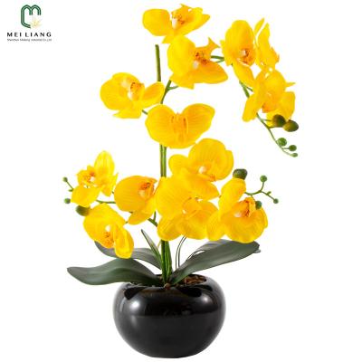 China Simulation Real Touch Orchids Minimalist High Quality Artificial Silk Orchid Floral Yellow Flower Potted In Black Round Ceramic Layout for sale