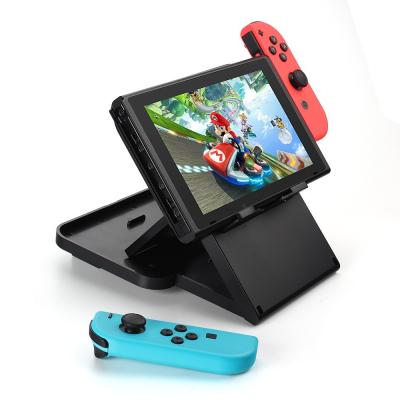 中国 任天堂スイッチのための黒い多角度のゲーム コンソール ホールダー/Playstand 販売のため