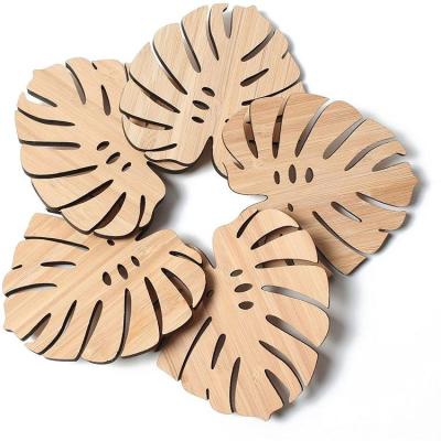 China 2021 Sustainable Hot Sale Turtle Leaf Tropical Leaf Plant Eco Friendly Drink Coffee Cup Wood Carving Coaster for sale