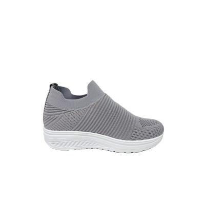 China Cushioning Newest Design Popular Wedges Fly Knit Shoes Cheap Women Fashion Casual Fly Knit Walking Sneakers for sale