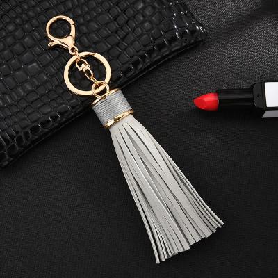 China 2019 Newest Fashion Promotion Gift Women Bag Tassel Fashionable Charm Pendant Key Chain For Handbag for sale