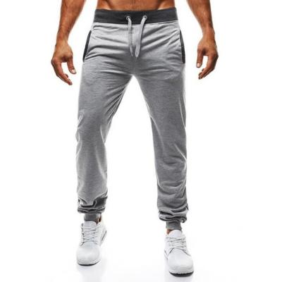 China Fashion Custom Logo Anti-Static Private Sweatpants Exercise Men's Loose Elastic Jogger Pants for sale