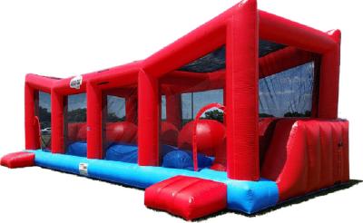 China Funny 0.55 mm PVC Tarpualin Red Inflatable Wipeout Game With Logo Printing for sale