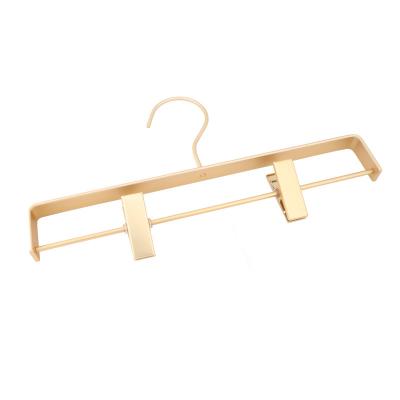 China Wardrobe Metal Gold Cloth Hangers For Boutiques Cabinet Panty Hangers With Clips for sale