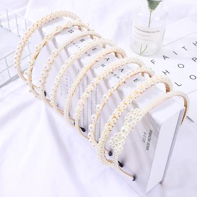 China Fashionable Custom Women's Simple Korean Hair Band Hair Accessories Braided Pearl Hair Band For Women for sale