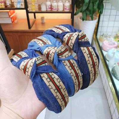 China High-end fashion temperament headband hair accessories letter ribbon headband denim knotted wide brim pure fashionable color fabric for sale