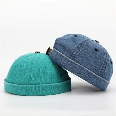 China JOINT Wholesale Custom Design Your Own Logo Brimless Logo High Quality Plain Washed Denim Hat, Retro Rolled Cuff Visorless Skull Docker Hat for sale