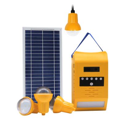 China Home Portable Solar Charger Mobile Phone Lighting 4 Rooms LED Light FM Radio Solar Night Lamp Kits for sale