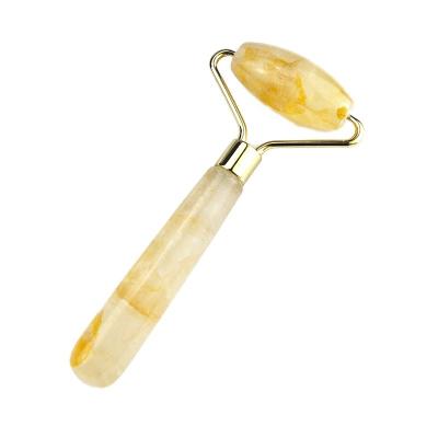 China Face Massage Tools Natural Yellow Citrine Facial Roller 100% Natural Jade Massager for Muscle Massage Skin Care Products for sale