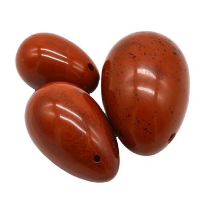 China Red Jasper Carved Drilled Jade Eggs Natural Yoni Eggs Set for Women's Physiological Health OEM Approved for sale