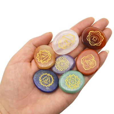 China Engraved Carving Polished Palm Pocket Stone Reiki Balancing Healing Crystal 7 Chakra Stones Sets for Love Theme for sale