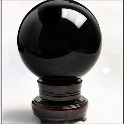 China Pedra curativa natural de esfera negra de obsidiana com propriedades de esfera de bola Esfera de cristal grande à venda