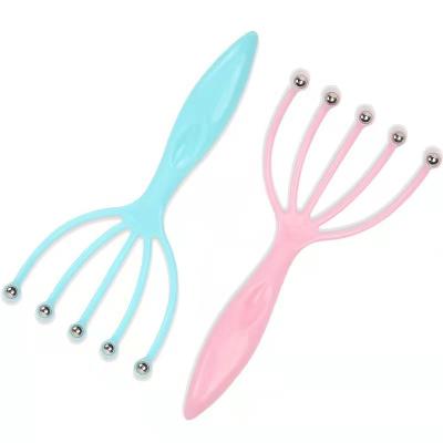 China Massajador de cabeça azul/rosa com cinco garras Bola de aço para massagem de relaxamento do couro cabeludo Ferramentas de massagem para alívio de dor de cabeça 100g Ferramentas de dragagem de meridianos à venda