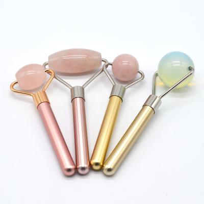 China Natural Rose Quartz Facial Massage Roller for a Refreshed and Revitalized Complexion for sale