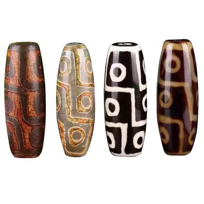 China Técnica Pedra preciosa natural polida Tibetan 9Eye Dzi Bead 40mm Agate Barrel Beads para jóias à venda