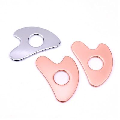 China Stainless Steel Heart-shaped Hollow Gua Sha Board Metal Facial Beauty Tool for Full-body Massage Area and OEM/ODM for sale