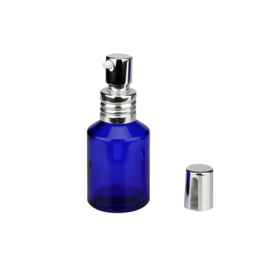 China Hot Selling Luxury Shoulder Oblique Blue Lotion Bottle Lotion Glass Pump Empty Bottles 15ml 30ml 60ml 100ml for sale