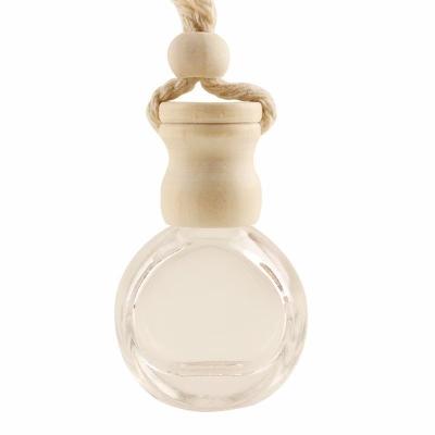 China Cosmetic Hot Sale Fashion Empty Square Round Shape Glass Cylindrical Bottle With Rope For Car Perfume 8ml for sale