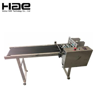 China Oil Resistant Automatic Paging Machine , Adjustable Speed ​​Paging Conveyor With Material Collector And Counter for sale