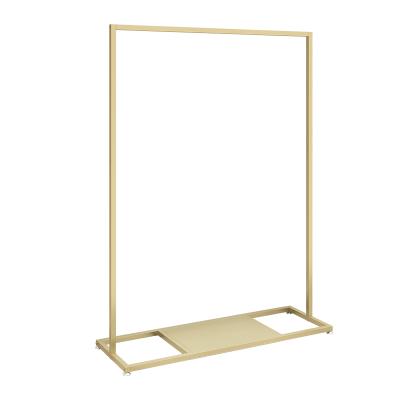 China Clothes Shop Boutique Floor Standing Wholesale Clothes Stores Metal Clothing Rack Wall With Shelf for sale