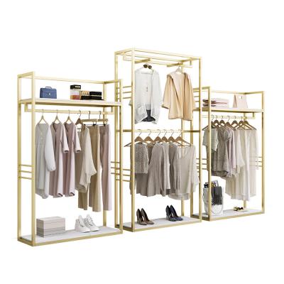 China Clothing store retail gold stainless steel clothes rack ladies brass clothing rack for stores shop display for sale