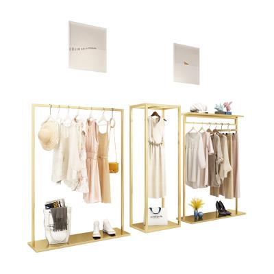 China Rose Gold Clothing Store Furniture Boutique Furniture Shelf Metal Clothing Store Display Racks for sale